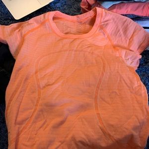 orange lulu shirt